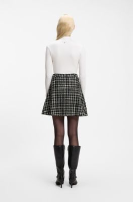 Rollneck top in ribbed stretch jersey with metallic logo, Natural