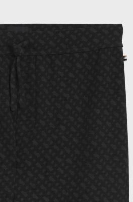 Pantaloni del pigiama con polsini in tessuto a nido d&rsquo;ape a stampa monogramma, Nero
