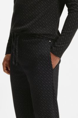 Cuffed pyjama bottoms in monogram-print waffle fabric, Black