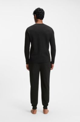 Pantaloni del pigiama con polsini in tessuto a nido d&rsquo;ape a stampa monogramma, Nero
