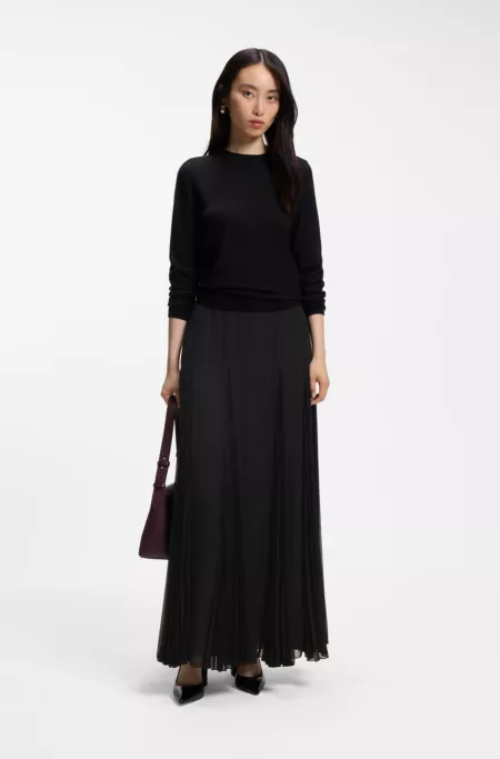 Long-length skirt with fluid plissé inserts