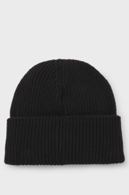 Gorro de punto en canal&eacute; con logo bordado en letra manuscrita, Negro