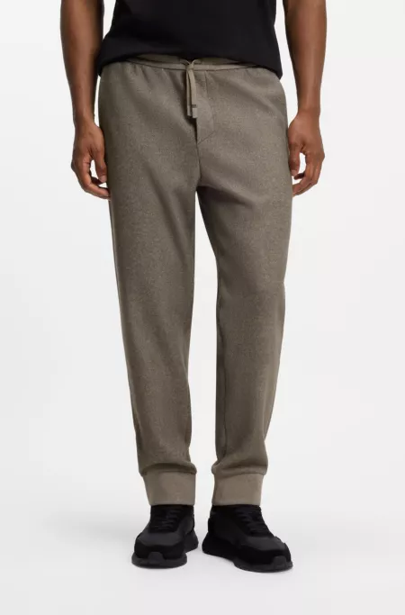 Regular-fit trousers in melange fabric with logo