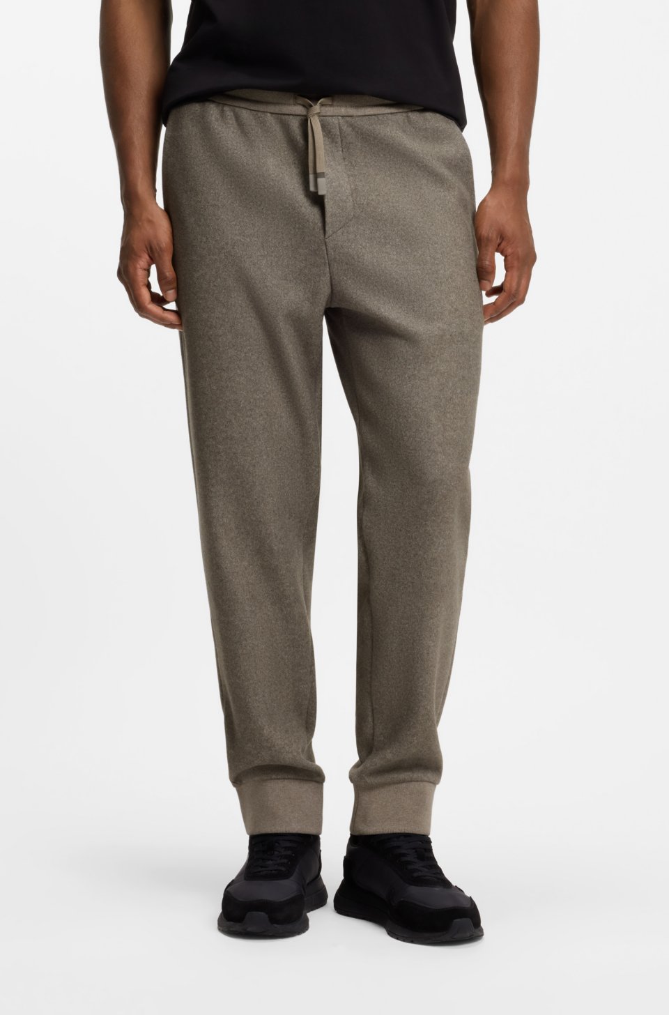 Regular-fit trousers in melange fabric with logo