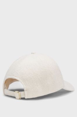 Six-panel cap in a wool-blend boucle, Natural