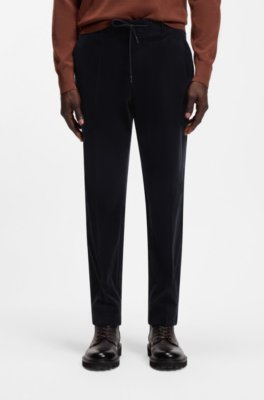 Tapered-fit trousers in stretch corduroy
