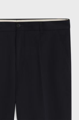 Pantaloni con fit affusolato in tessuto italiano con micromotivo, Blu scuro