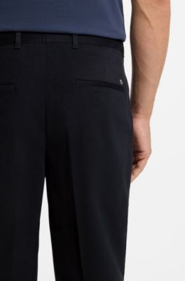 Pantaloni con fit affusolato in tessuto italiano con micromotivo, Blu scuro