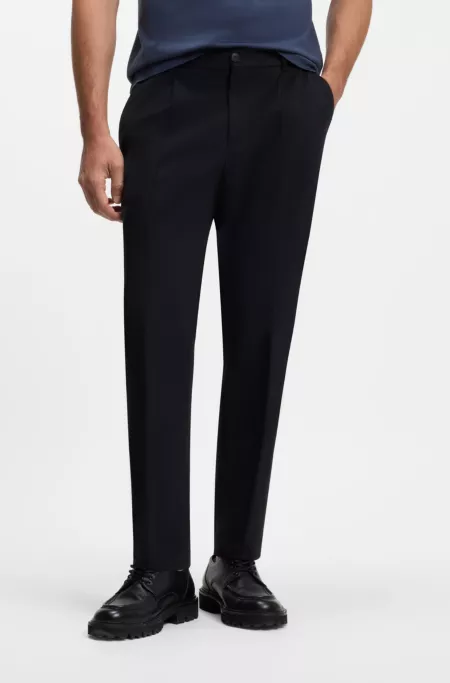 Tapered-fit trousers in Italian micro-patterned fabric