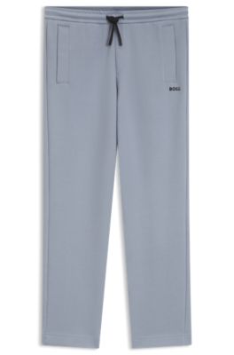 Piqu&eacute; casual trousers with tennis-inspired details, Grey