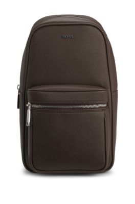Sleek faux-leather backpack with metal branding, Dark Brown