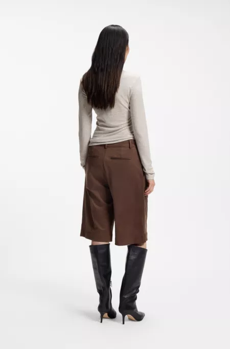 Regular-fit shorts in faux suede with front pleats