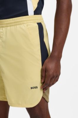 Performance tennis shorts with colour-block details, Yellow