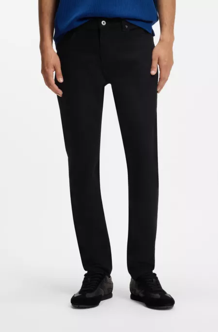 Jean Skinny noir délavé