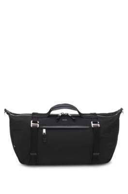 Holdall bag with metal logo and front pocket