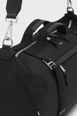 Holdall bag with metal logo and front pocket, Black