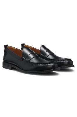 Penny loafers in brush-off leather, Black