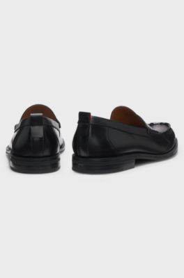 Penny loafers in brush-off leather, Black