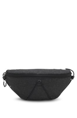 Textured belt bag with an adjustable waist strap
