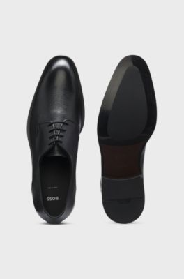Scarpe stringate realizzate in Italia in pelle martellata, Nero