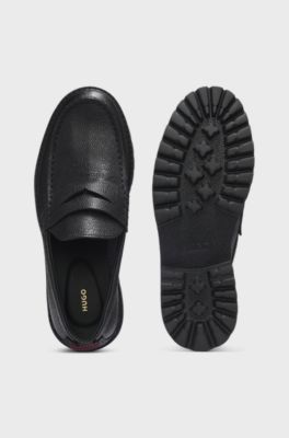 Lug-sole loafers in grained leather, Black