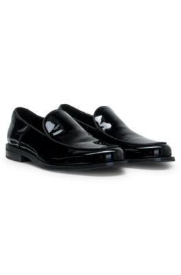 Patent-leather slip-on loafers with embossed logo, Black