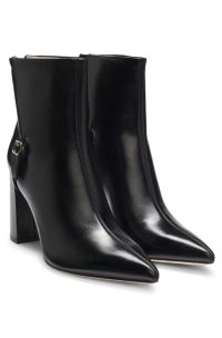 Pointed-toe boots in glossy leather with buckle detail, Black