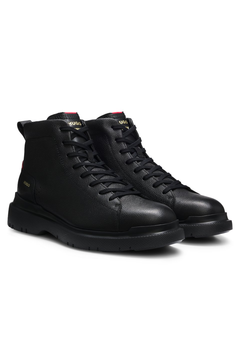Grainy leather boots with embossed logo