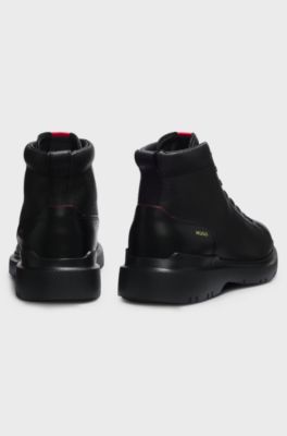 Grainy leather boots with embossed logo, Black
