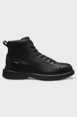 Grainy leather boots with embossed logo, Black