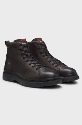Grainy leather boots with embossed logo, Dark Brown