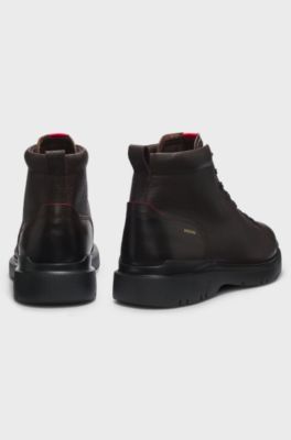 Grainy leather boots with embossed logo, Dark Brown