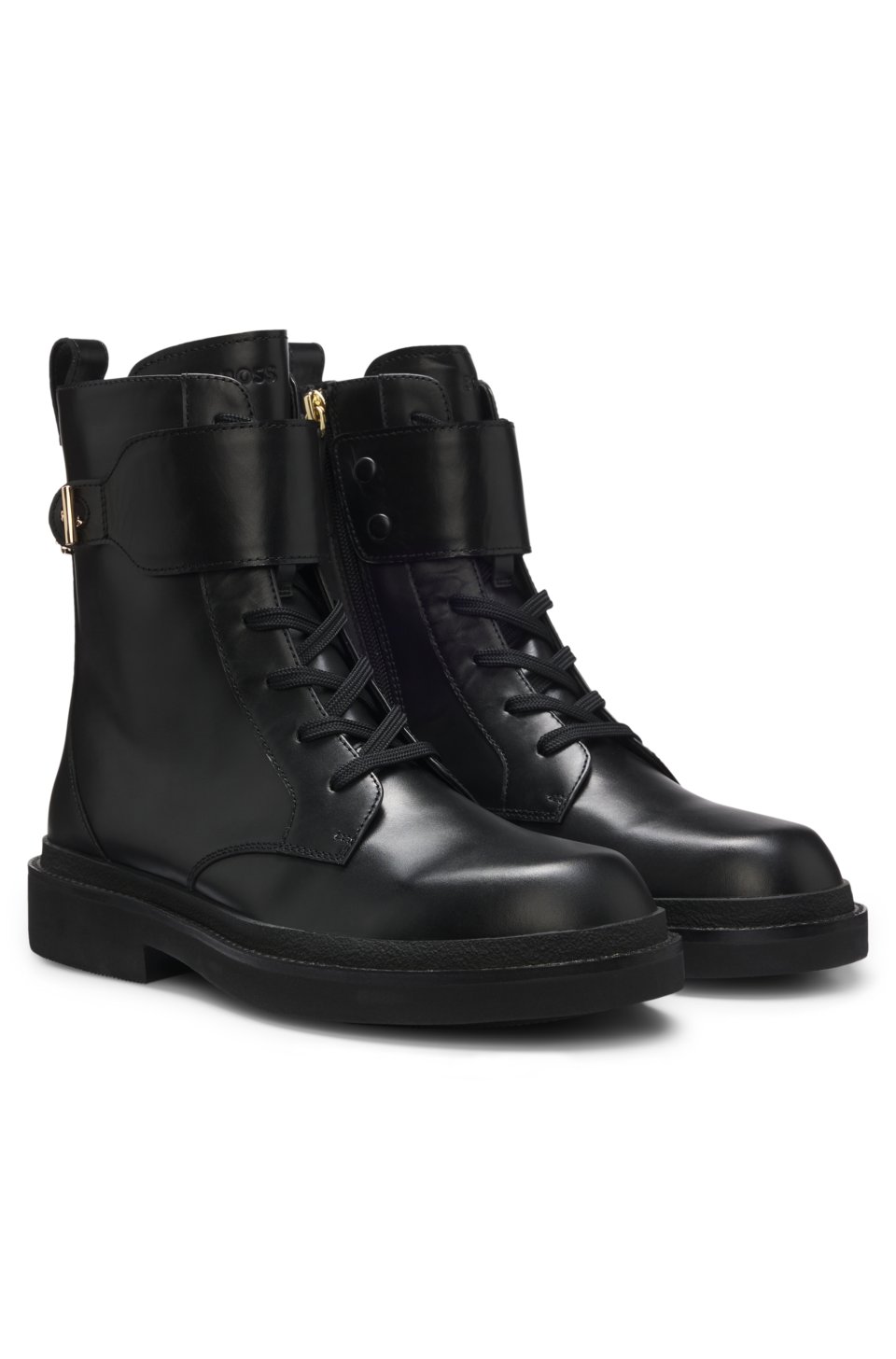 Lace-up leather boots with gold-tone hardware