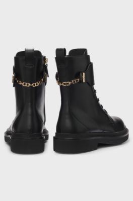 Lace-up leather boots with gold-tone hardware, Black