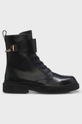 Lace-up leather boots with gold-tone hardware, Black