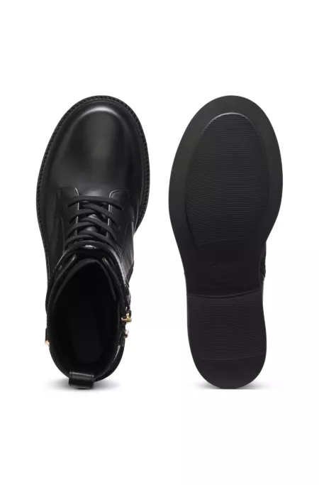 Lace-up leather boots with gold-tone hardware