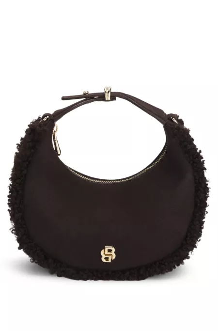 Sac d'épaule en forme de croissant avec finitions en fourrure synthétique
