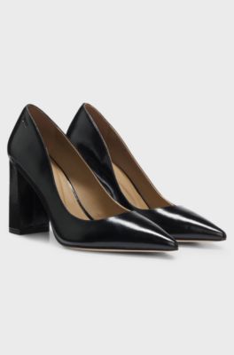 High-heeled pumps in leather with pointed toe, Black