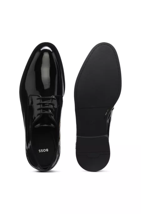 Derbies en cuir verni à surpiqûres décoratives