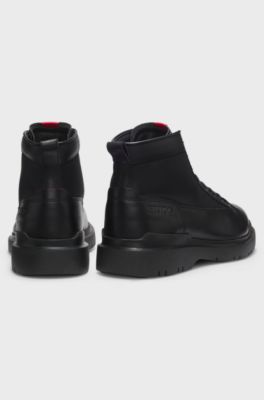 Half boots in leather with textured panels, Black