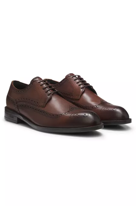 Chaussures derby en cuir intemporelles à surpiqûres richelieu