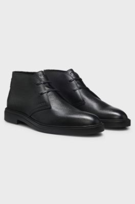 Wool-lined Chukka boots in grained leather, Black