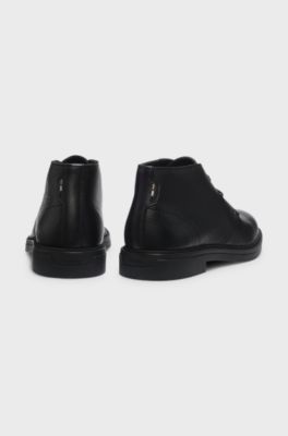 Wool-lined Chukka boots in grained leather, Black