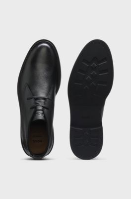 Wool-lined Chukka boots in grained leather, Black