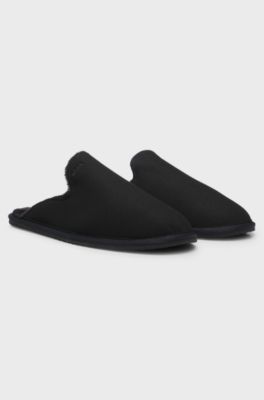 Shearling-lined slip-on slippers with logo detail, Black