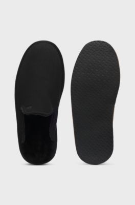 Shearling-lined slip-on slippers with logo detail, Black