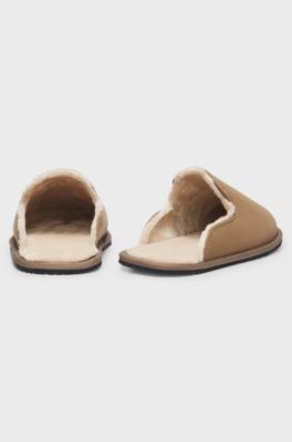 Shearling-lined slip-on slippers with logo detail, Beige