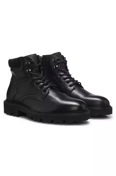 Lace-up boots in leather with padded collar