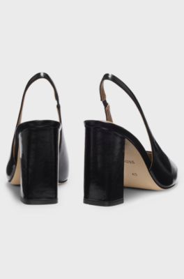 Heeled pumps in leather with slingback strap, Black