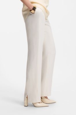 Heeled pumps in leather with slingback strap, Natural